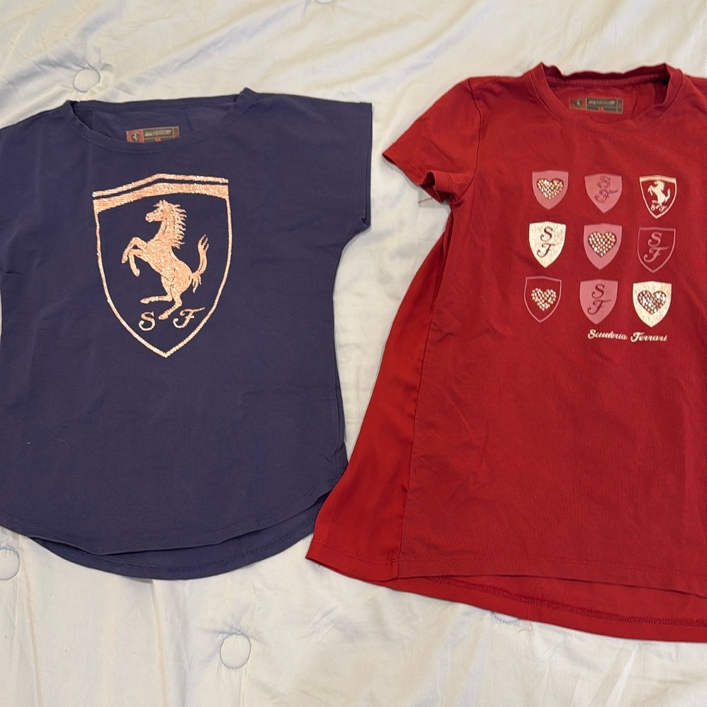 Girls authenticic Ferrari shirts from the Ferrari store in Modena Italy.